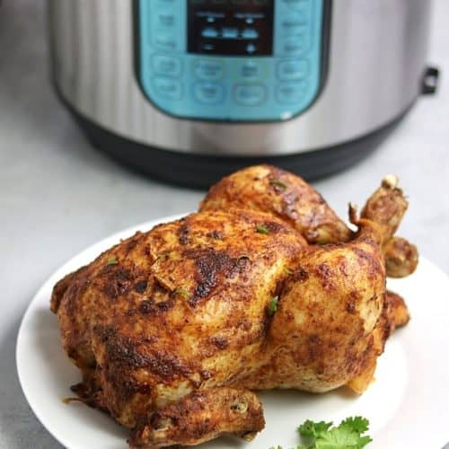 instant pot whole chicken on white plate