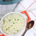 Instant pot white rice in orange bowl