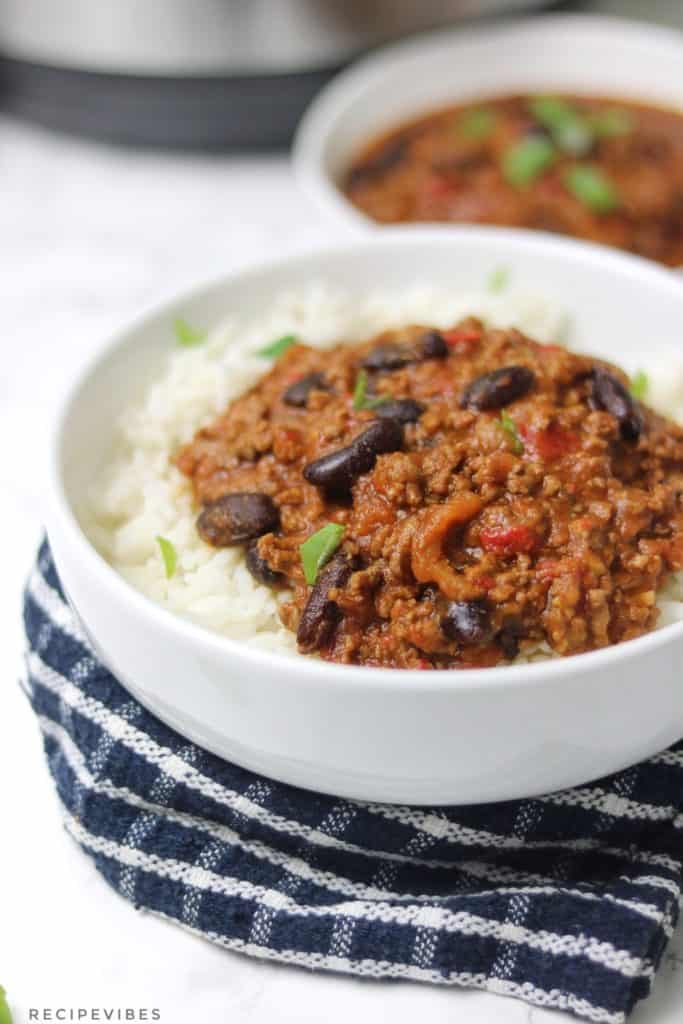 instant pot chili served on rice