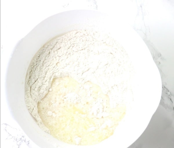 wet ingredients milk and oil added to dry ingredients