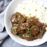 Instant pot beef tips served on white rice