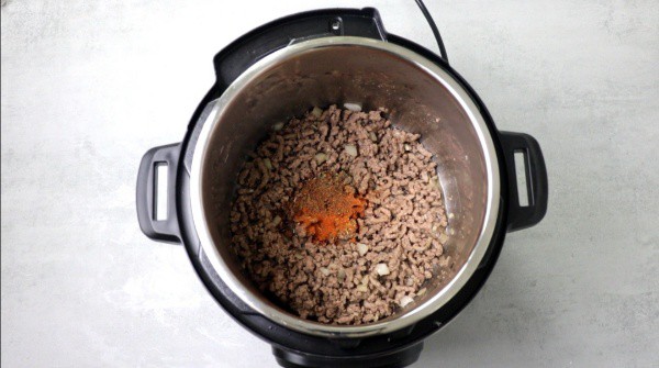 ground beed and spices in the instant pot