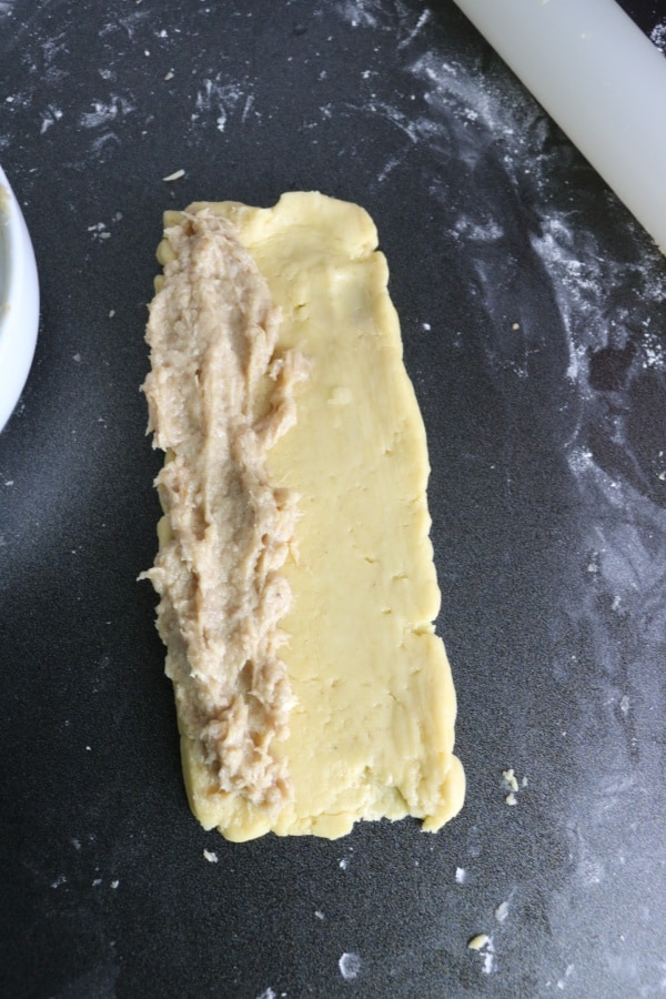 showing sausage meat on pastry