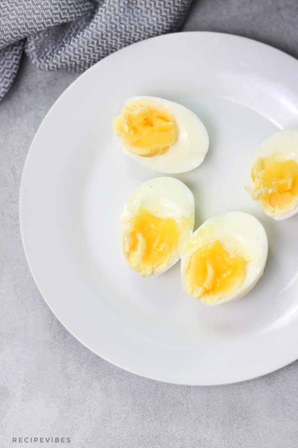 soft boiled eggs on white plate