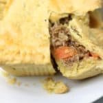meat pie cut into showing the tender , creaming filling