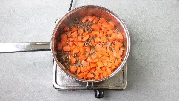 process shot of meat pie filling being made
