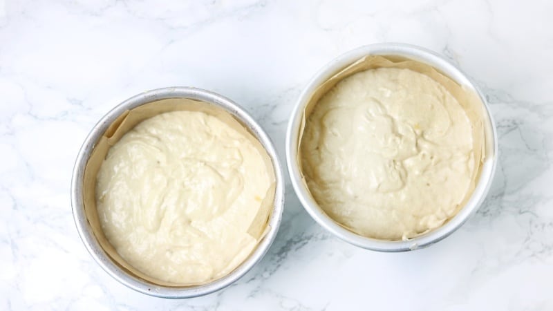 pour batter in cake pans