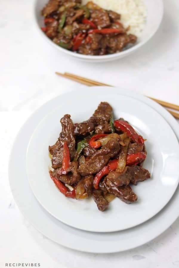 chinese pepper steak served on white plate