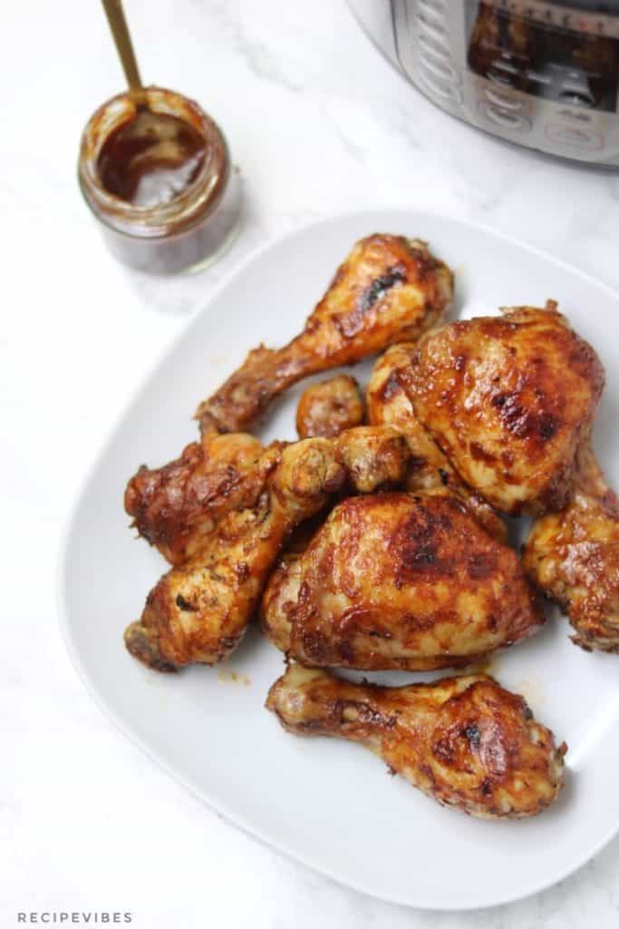instant pot bbq chicken thighs and drumsticks on plate