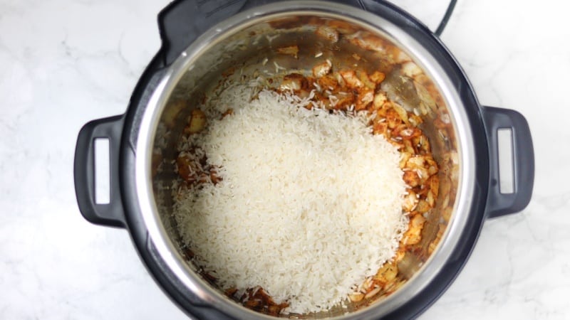 saute onion, spices and stir in rice