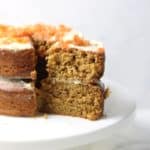 carrot cake with a slice cut out