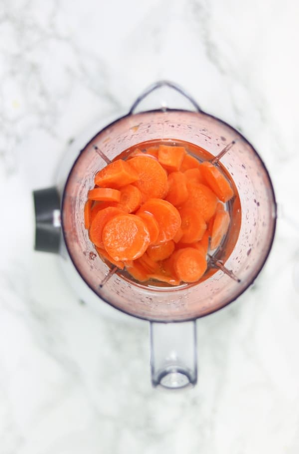 carrots, water and sugar in a blender