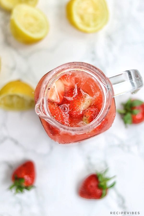 Strawberry lemonade in pitcher