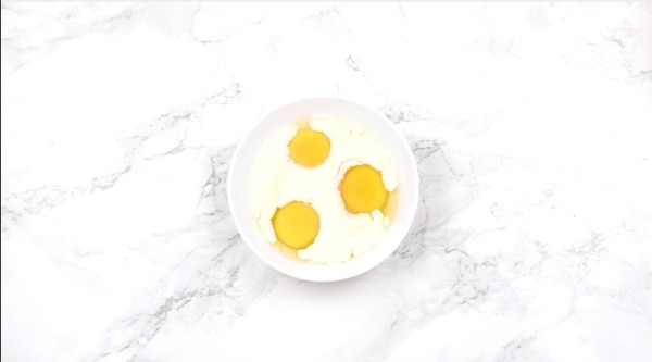 eggs and milk in a bowl.