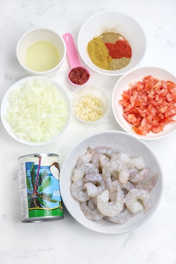 Ingredients for the dish displayed on a white surface.
