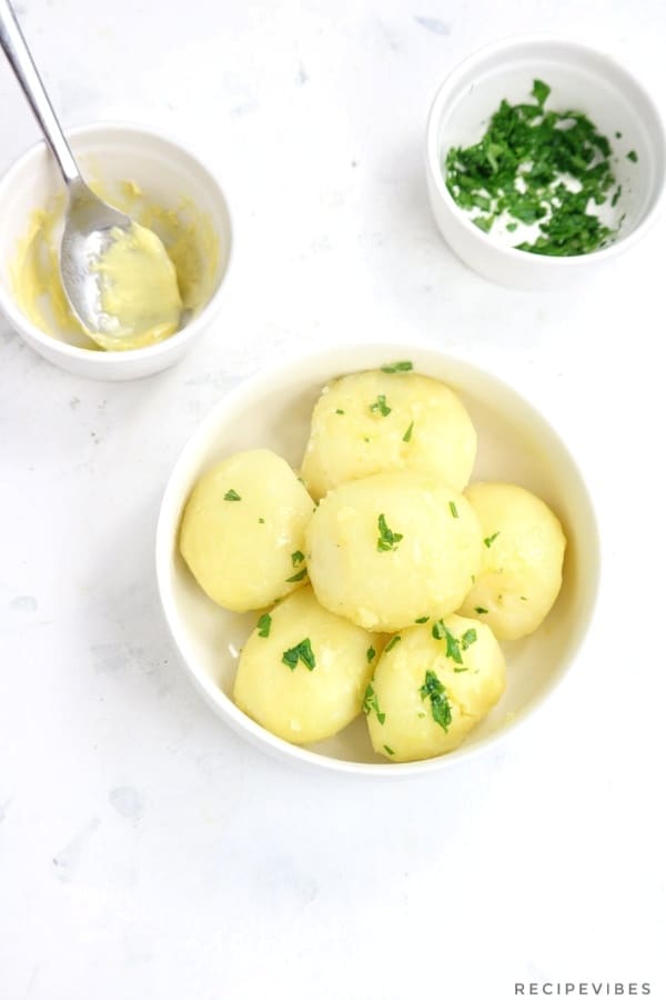 boiled potatoes with butter and parsley.