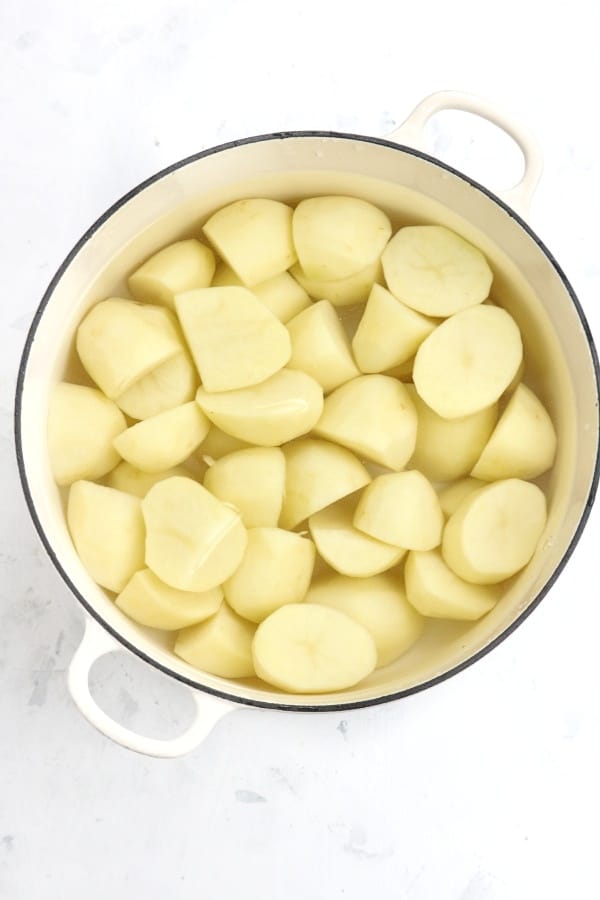 potatoes in a pot covered with water.