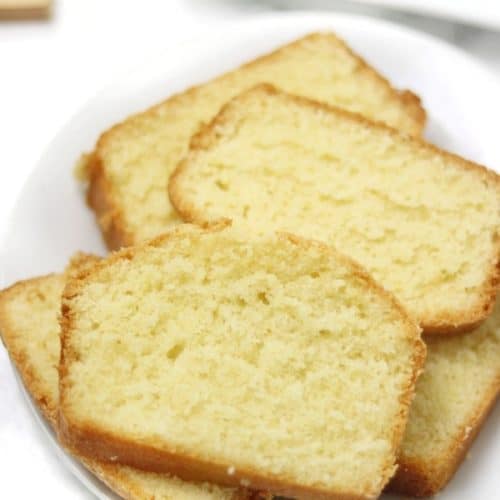 Slices of pound cake on a white plate.