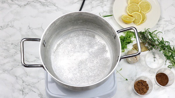 salt and water in a pot on stove.