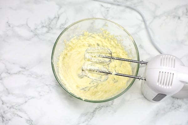Creamed butter and sugar in a mixing bowl.
