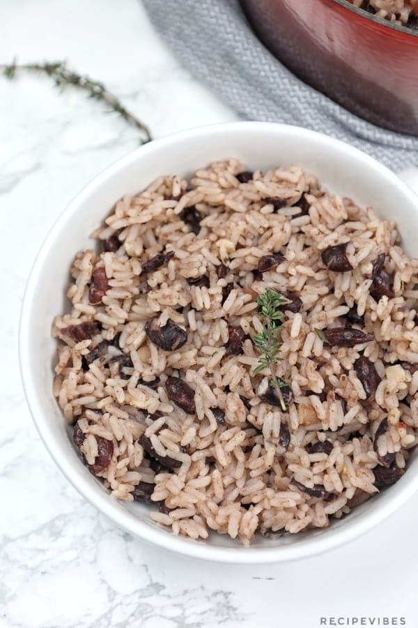 Jamaican rice and peas in a white plate.
