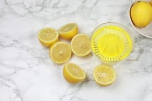 cut lemons being juiced.