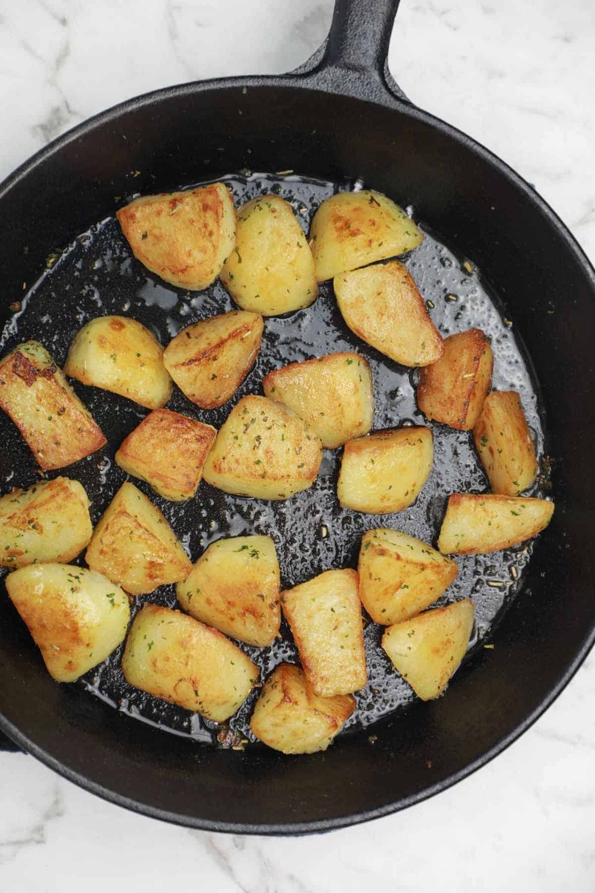 fried potatoes in skillet.