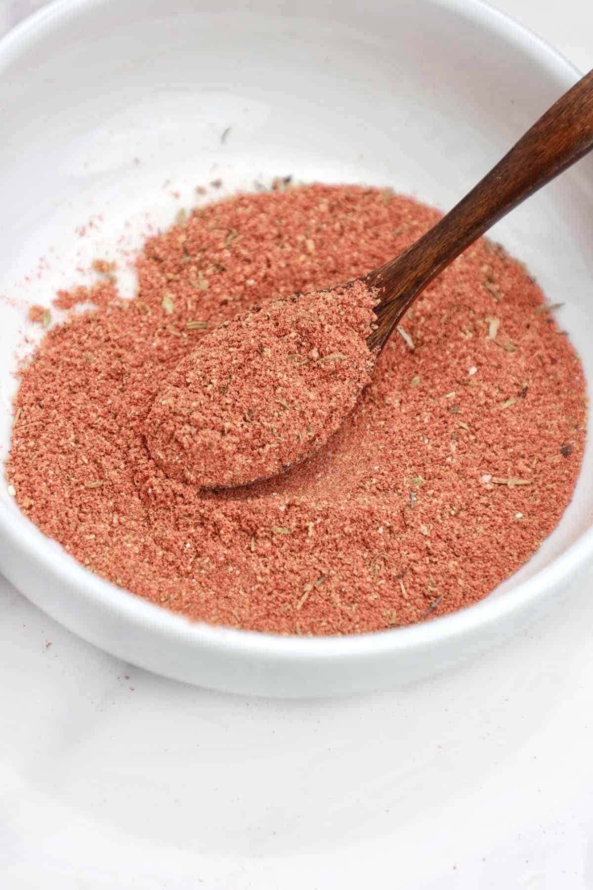 salmon seasoning in a small white bowl.