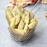 fried yam in slotted basket.