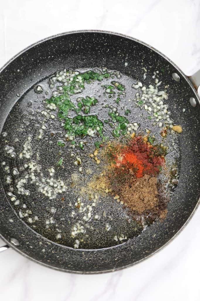 onion, garlic, and seasoning in a large skillet.