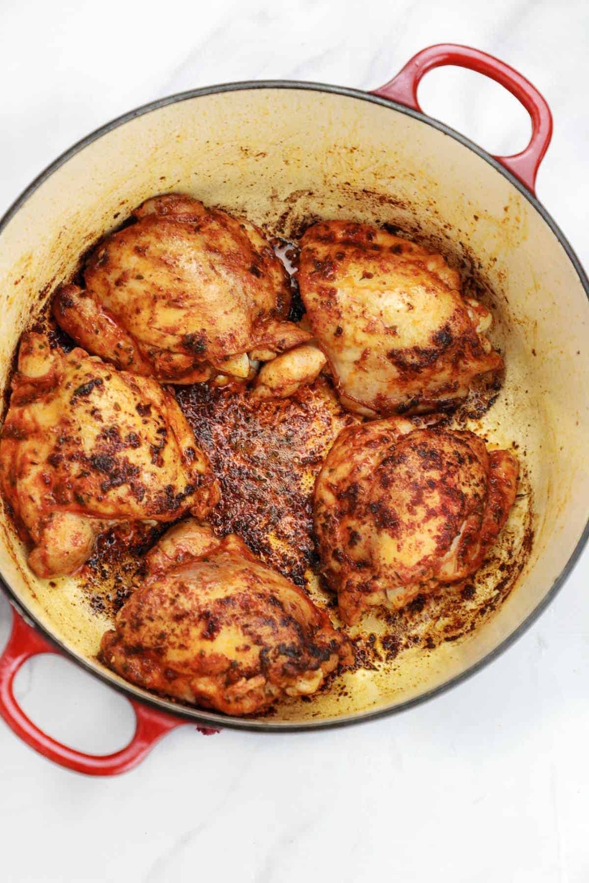 browned chicken in a pot.
