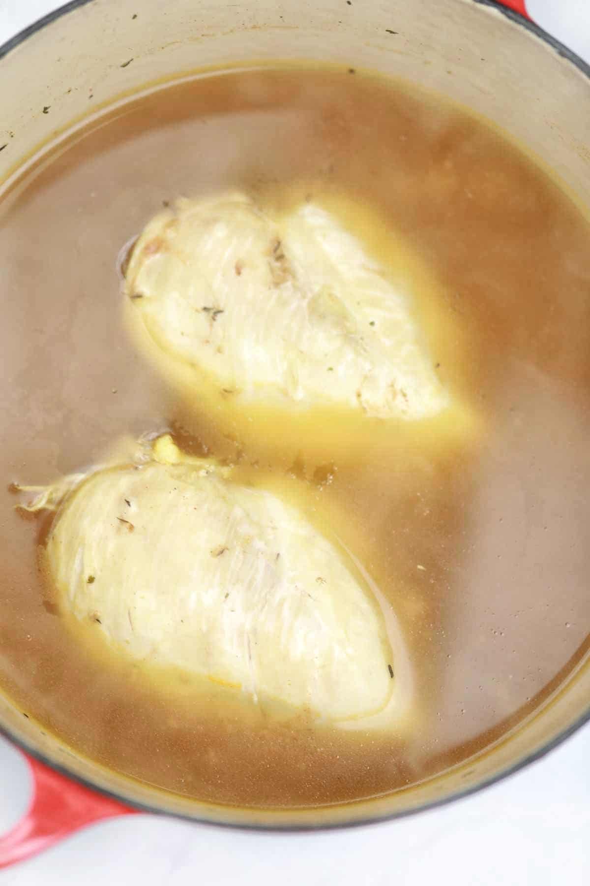 boiled chicken breasts in it's broth.