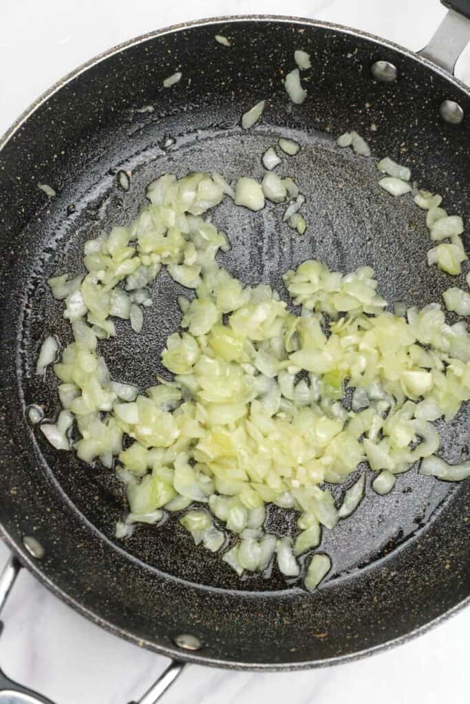 sauteed onions in a pan.