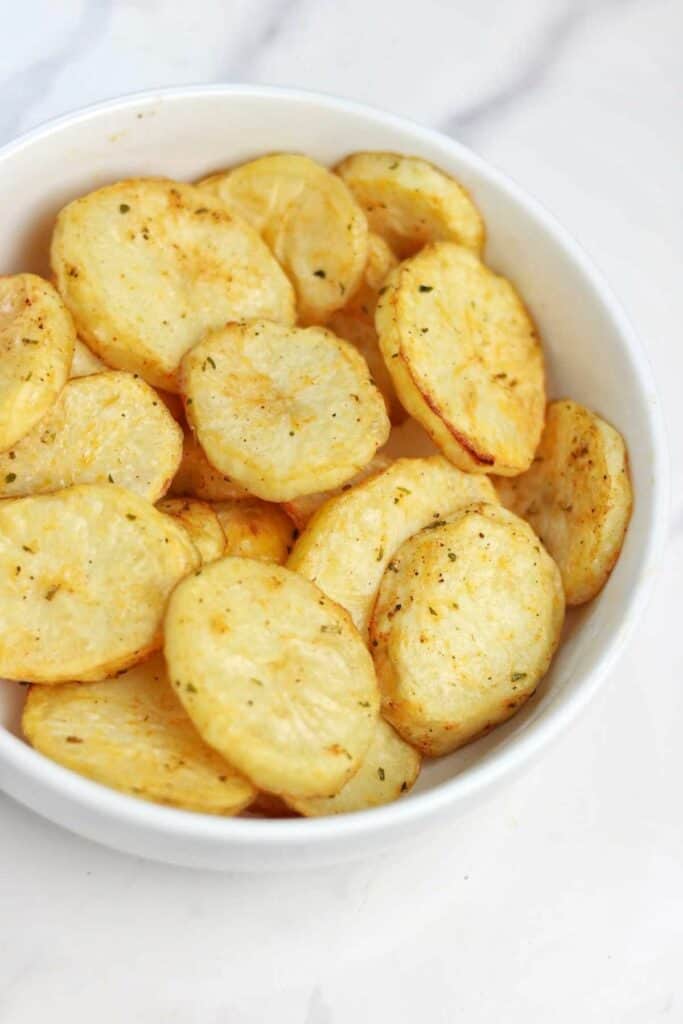 baked potato slices on a plate.
