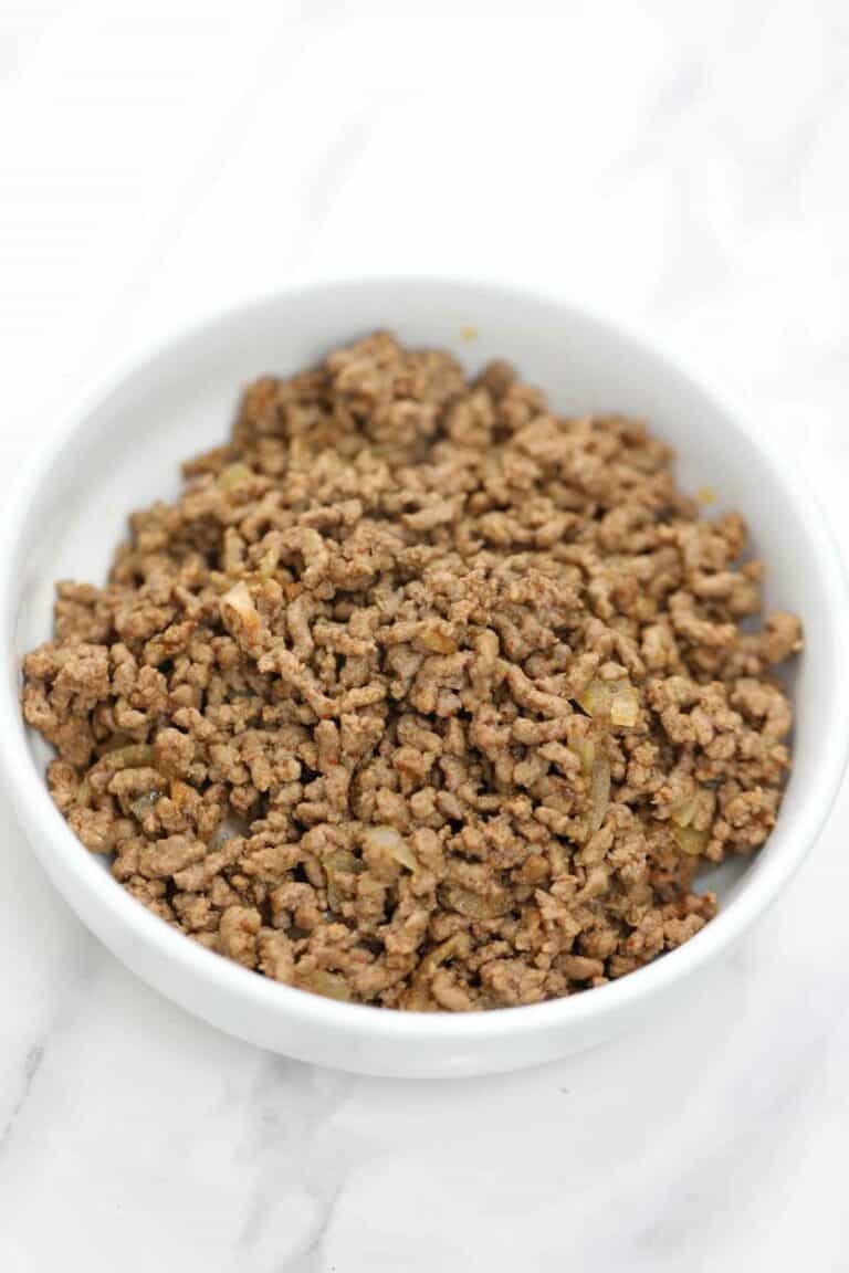 cooked ground beef served in a white plate.