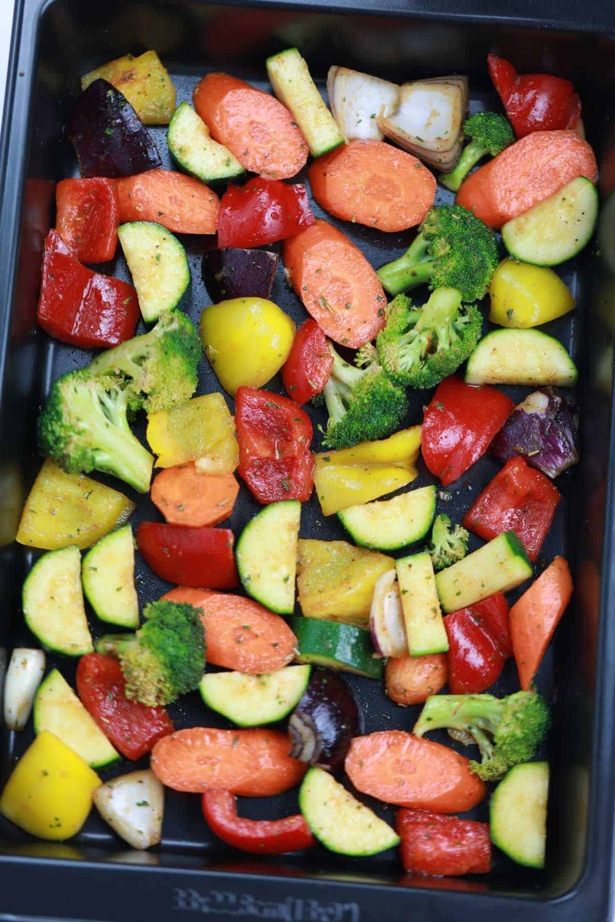 the veggies arranged in a baking pan.