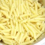 Boiled pasta in a colander.