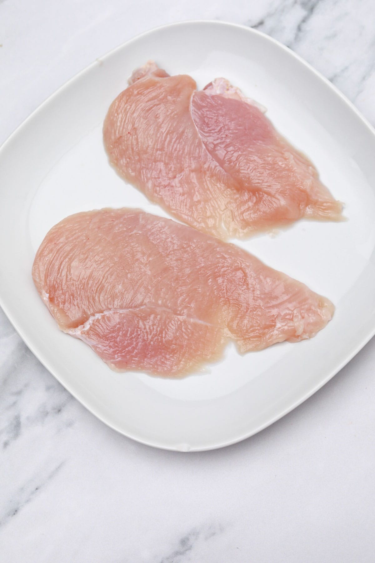 chicken breast sliced into thin pieces.