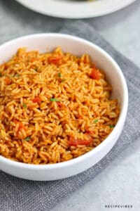 Instant pot Spanish rice served on a white plate.