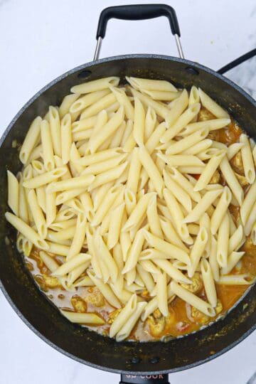 pasta added to the pan.