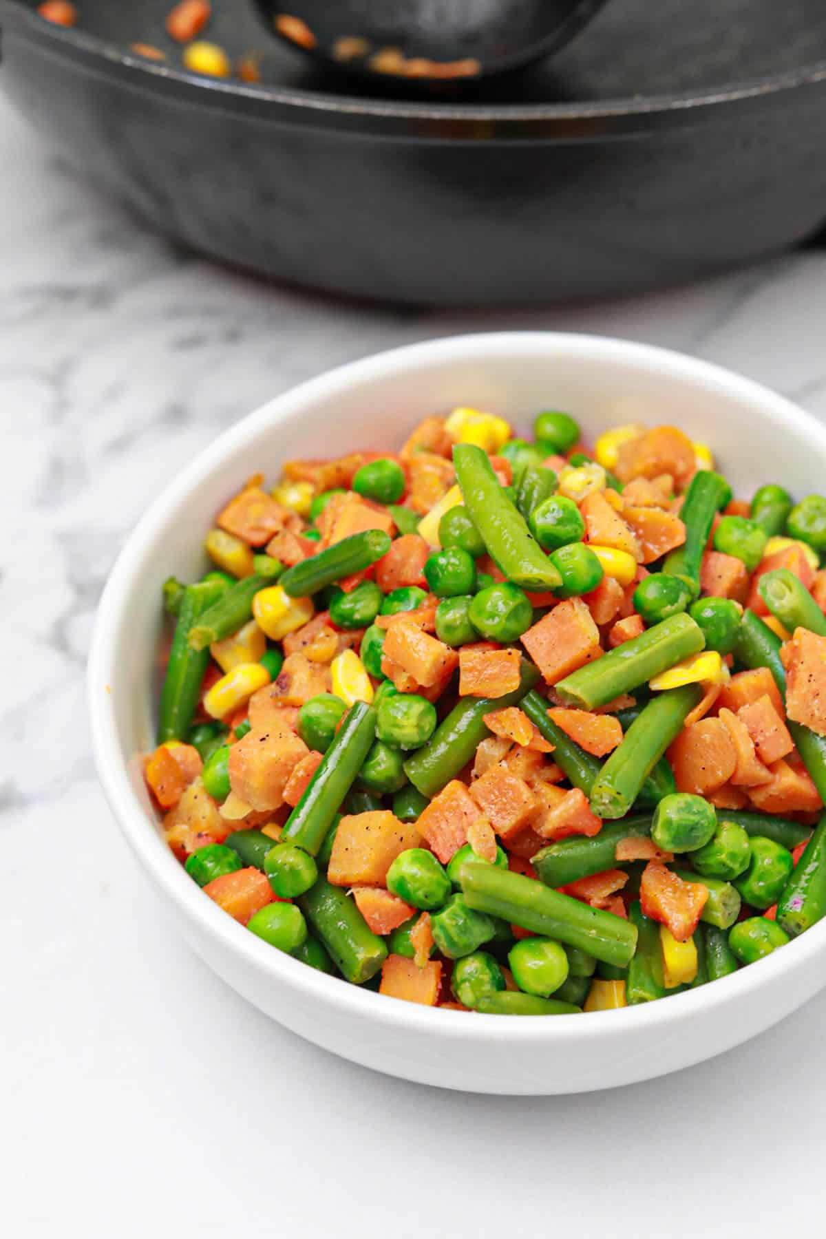 the cooked veggies served in  a bowl.