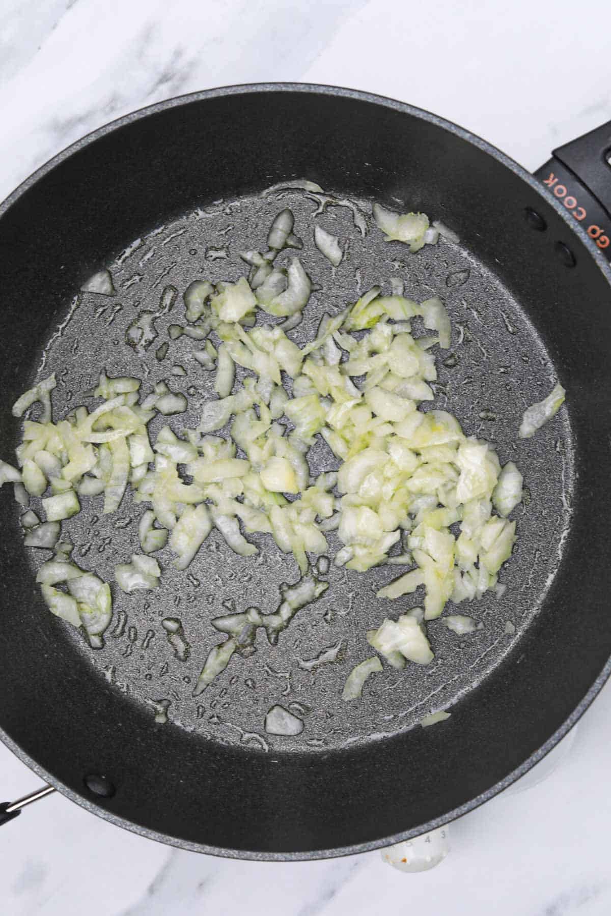 sauteed onions in a skillet.