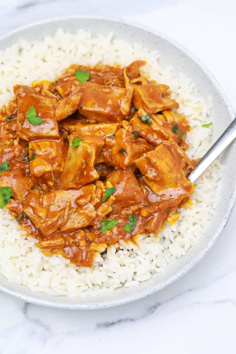 leftover turkey curry served on white rice.