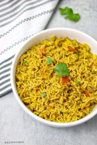 curry rice served in a white plate.