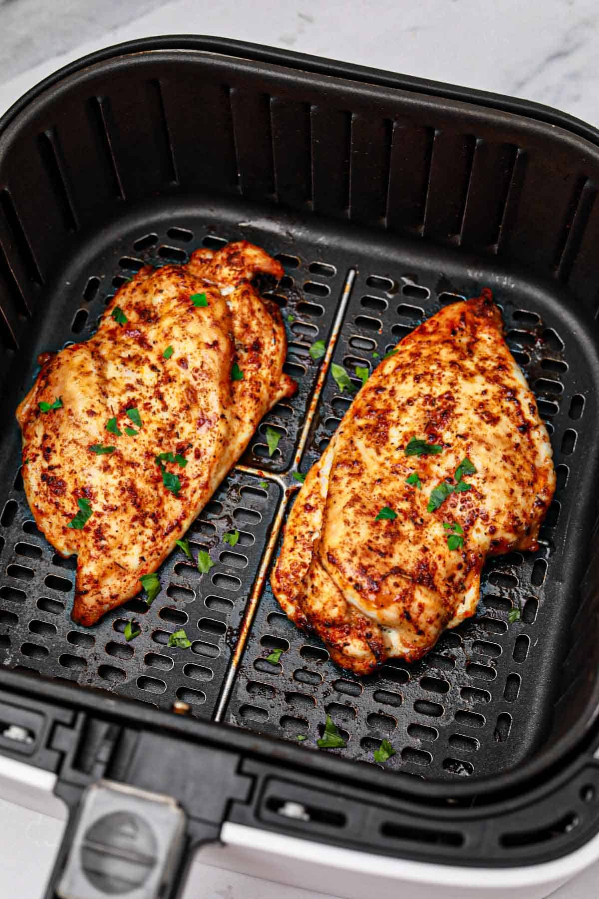2 boneless chicken breasts in air fryer.