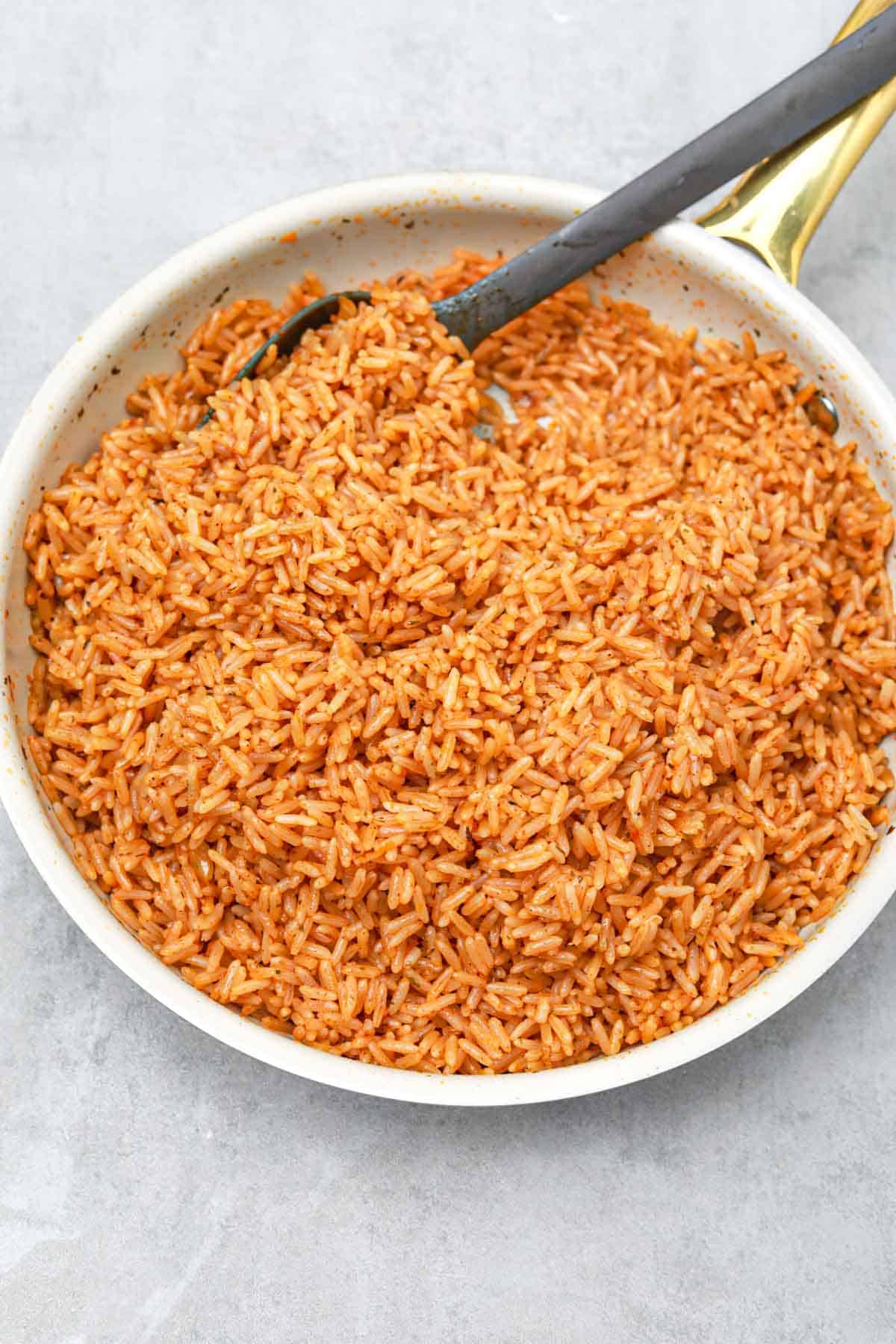 cooked seasoned rice in the skillet.