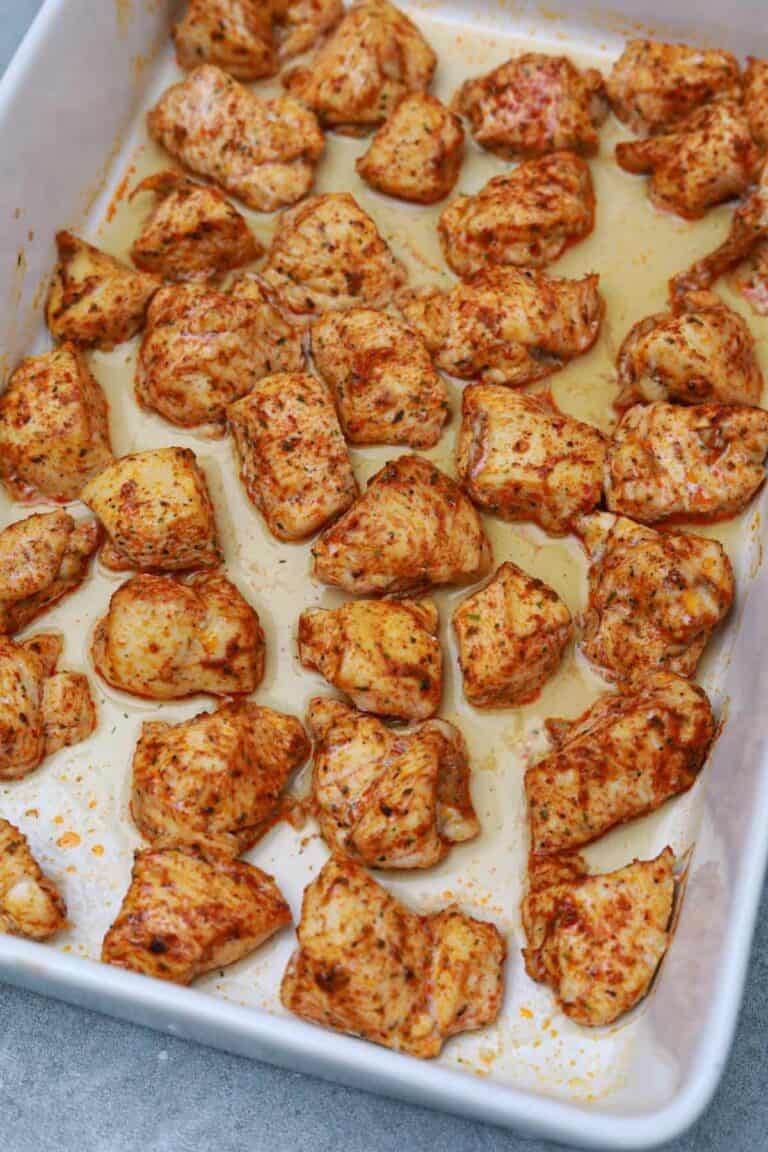 the cooked chicken bites in the baking dish.