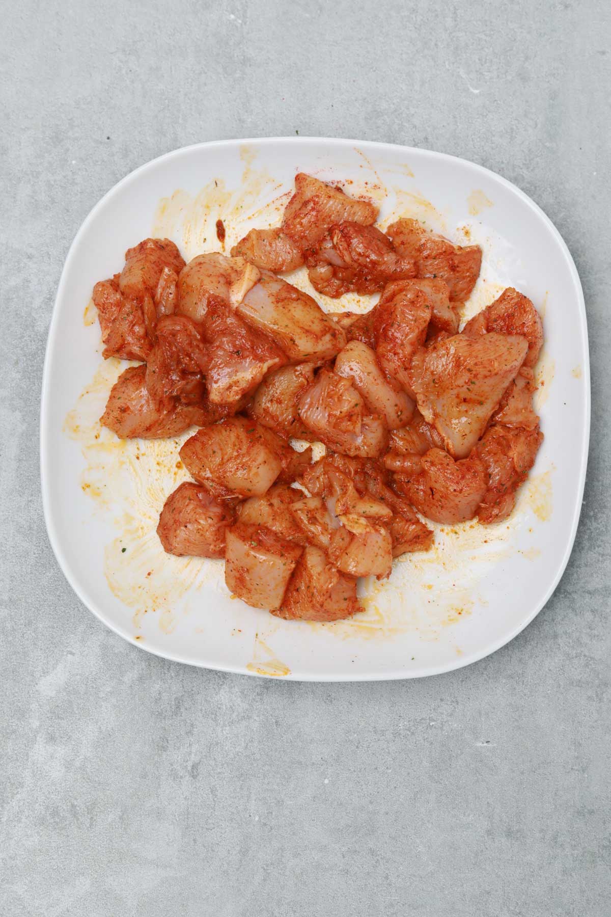 seasoned chicken cubes  in a bowl.