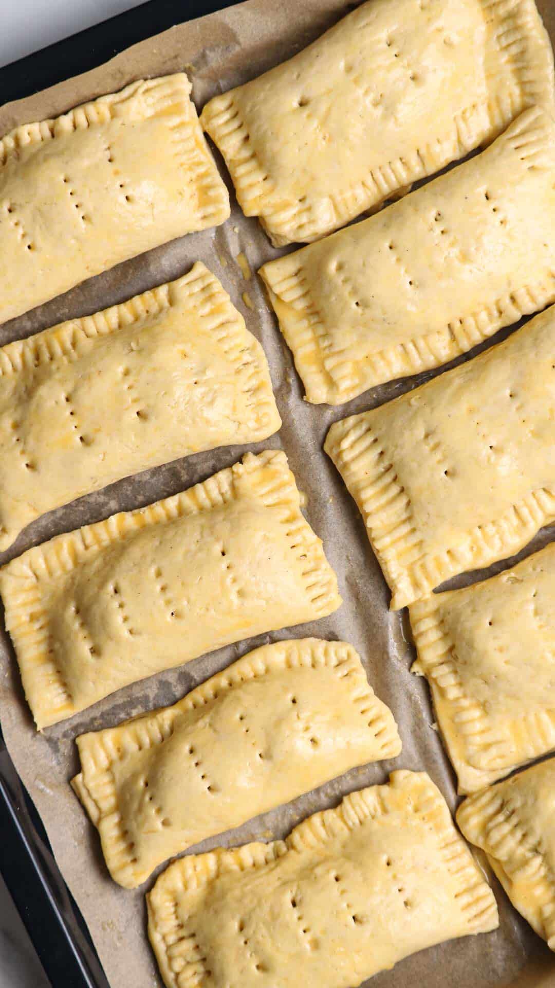 the pies on a baking tray.