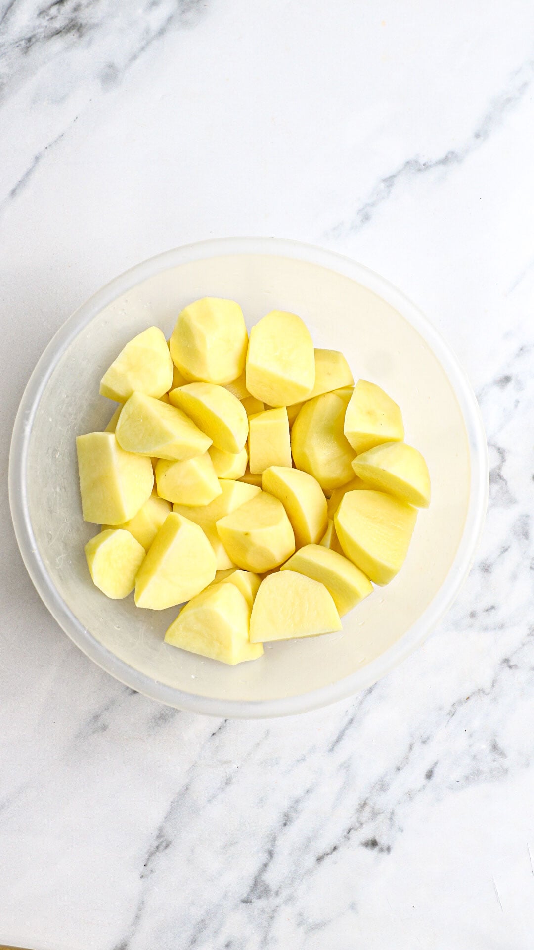 cut potatoes in a bowl.